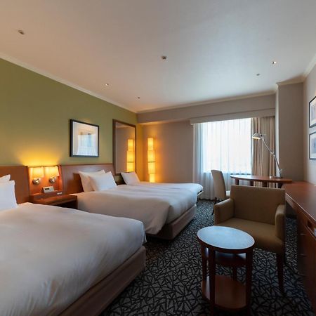 丰桥联合酒店 丰桥市 外观 照片 A room at the hotel