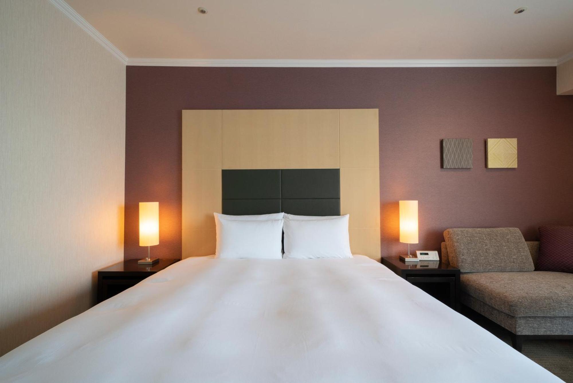 丰桥联合酒店 丰桥市 外观 照片 A bedroom at the hotel